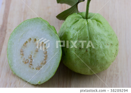 Half guava and slices with the complete one Half guava and slices with the complete one 38289294