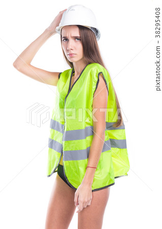 pretty brunette young woman in builder outfit and 38295408