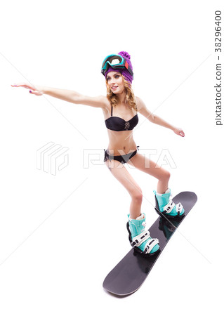 girl in bikini riding snowboard 38296400