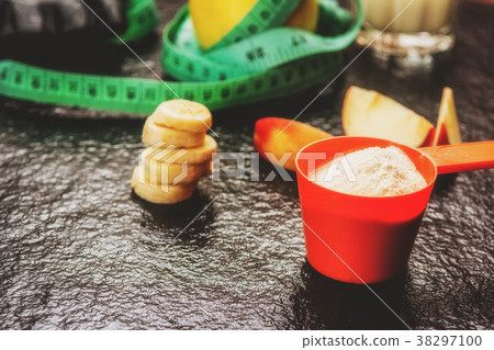 Protein powder in scoop 38297100