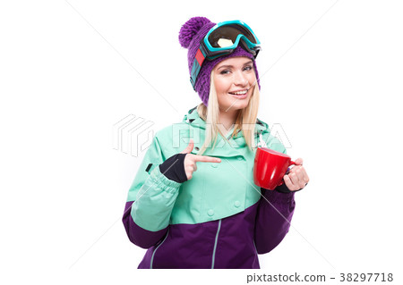 beautiful young blonde woman in colorful snow 38297718