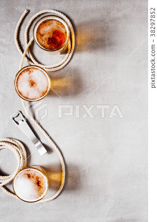 Background with glasses of light beer and rope 38297852