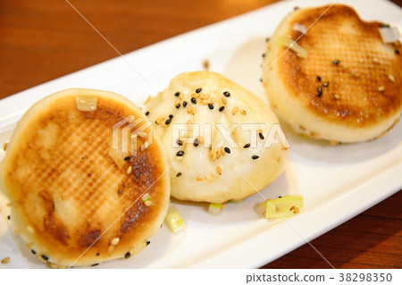 Delicious mini baked buns 38298350