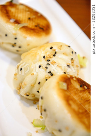 Delicious mini baked buns 38298351