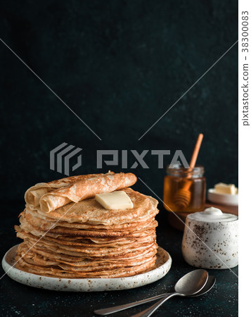 russian pancakes blini on black with copy space 38300083