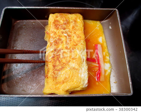 Cooking scene of thick baked egg with kanikama Cooking scene of thick baked egg with kanikama 38300342