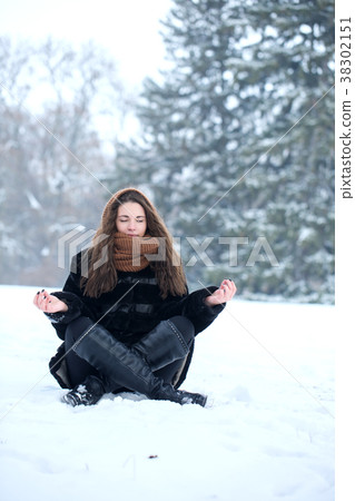 meditating in the snow 38302151