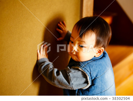 Boy walking on the wall 38302504