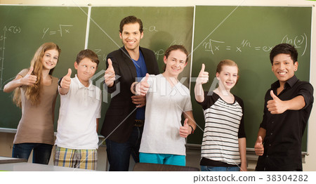 Teacher motivating students in school class Teacher motivating students in school class 38304282