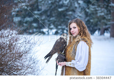 red-haired woman with a falcon red-haired woman with a falcon 38304447