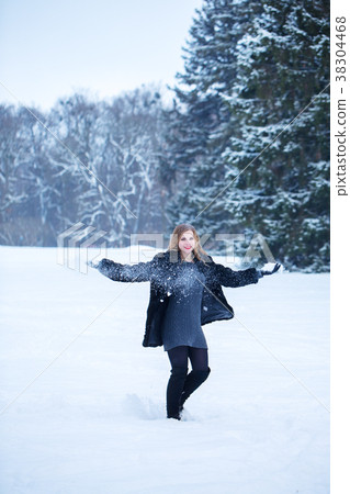 Happy woman on snow 38304468