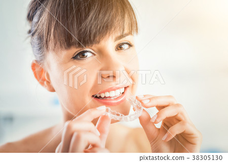 Beautiful smile and white teeth of a young woman. 38305130