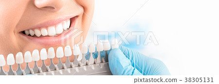 Beautiful smile and white teeth of a young woman. 38305131