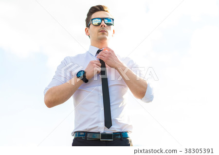 Attractive young busunessman in white shirt, tie 38305391