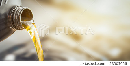 Motor oil pouring. Motor oil pouring. 38305636