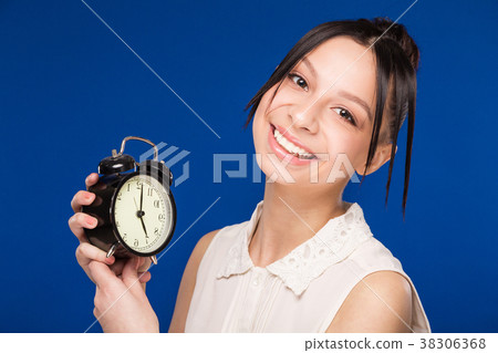 girl with an alarm clock girl with an alarm clock 38306368