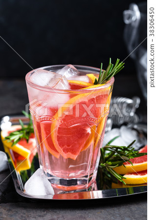 Grapefruit and fresh rosemary gin cocktail 38306450