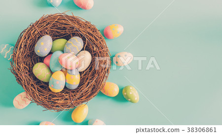 Colorful easter egg and nest on green pastel color 38306861
