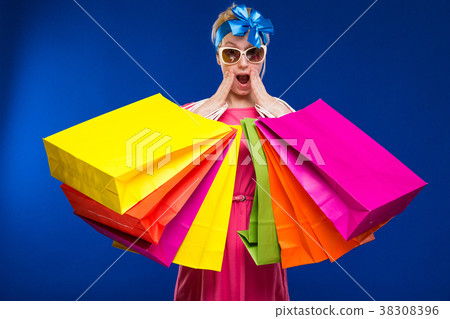 young girl with packages young girl with packages 38308396