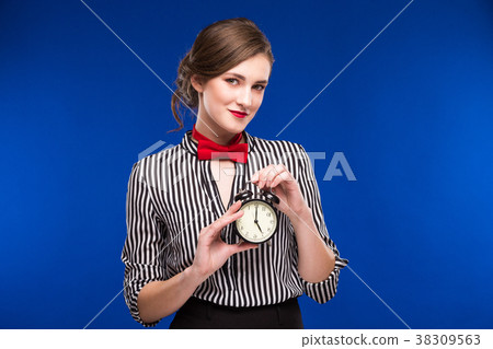 girl with an alarm clock girl with an alarm clock 38309563