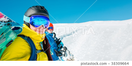 Panoramic photo of cheerful couple with snowboard Panoramic photo of cheerful couple with snowboard 38309664