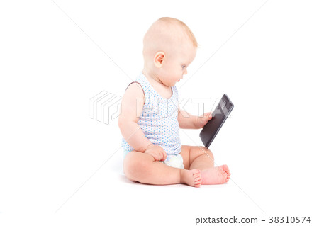 cute baby boy in white shirt with phone cute baby boy in white shirt with phone 38310574