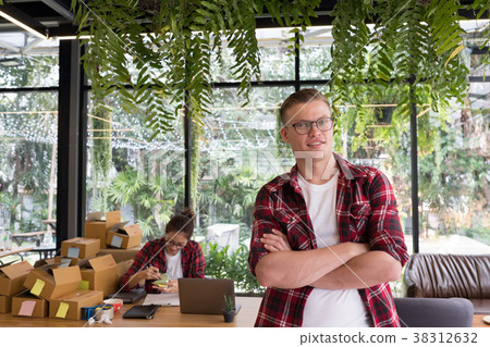 startup small business owner working at workplace. freelance couple seller check product order for delivery. Online selling, e-commerce, shipping concept 38312632