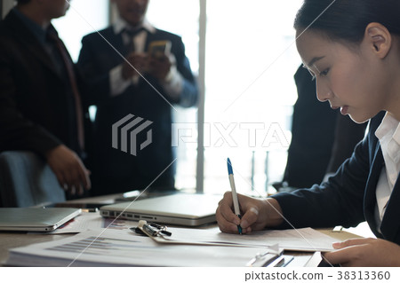 businesswoman sign business contract agreement. woman write on paper at office. female entrepreneur fill information on form businesswoman sign business contract agreement. woman write on paper at office. female entrepreneur fill information on form 38313360