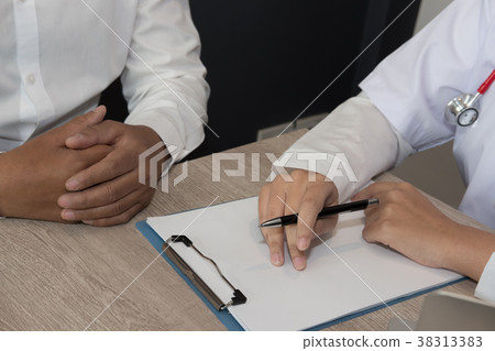 doctor explaining to patient about diagnosis at hospital. physician talk & give advice to man about his health at medical office doctor explaining to patient about diagnosis at hospital. physician talk & give advice to man about his health at medical office 38313383