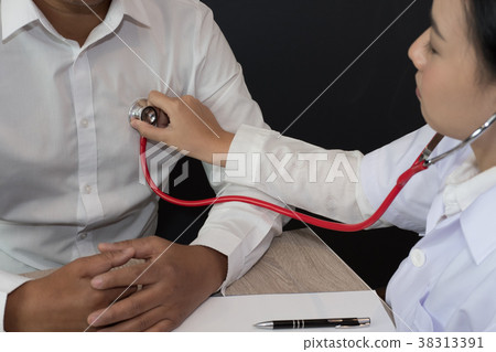 doctor use stethoscope to examine pulse rate on patient chest at hospital. physician measure heartbeat. health care check up 38313391