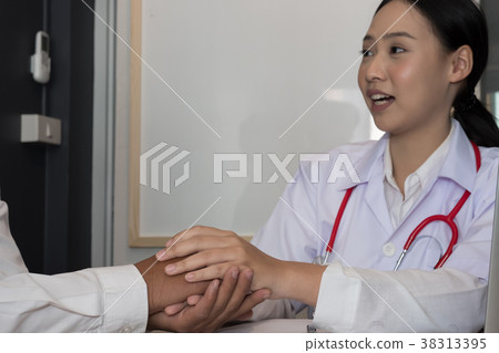 doctor holding patient hand & comforting him for bad news. physician support & encourage a man for medical examination. encouragement & empathy concept doctor holding patient hand & comforting him for bad news. physician support & encourage a man for medical examination. encouragement & empathy concept 38313395