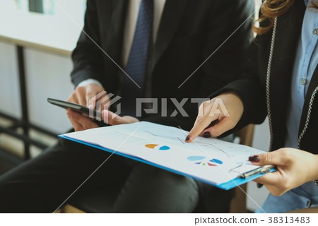 business adviser working with calculator & financial plan report at office. accountant doing accounting & calculating tax, revenue & budget. bookkeeper making calculation. finance & economy concept business adviser working with calculator & financial plan report at office. accountant doing accounting & calculating tax, revenue & budget. bookkeeper making calculation. finance & economy concept 38313483