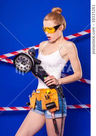 Pretty, slim builder girl in white shirt, builder 38315261