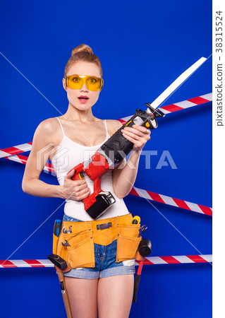 Young, pretty builder girl in white shirt, builder 38315524