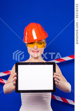 Pretty builder woman in white shirt, builder belt Pretty builder woman in white shirt, builder belt 38316143