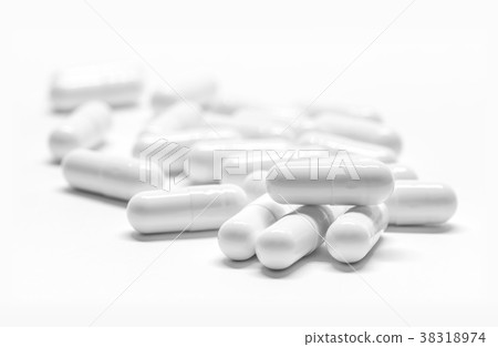 White medicine capsules on white background 38318974