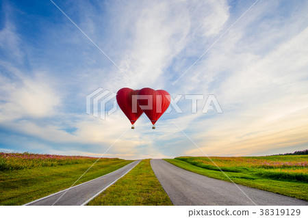 Beautiful Red balloon in the shape of a heart Beautiful Red balloon in the shape of a heart 38319129