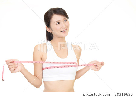 A woman measuring the chest A woman measuring the chest 38319656