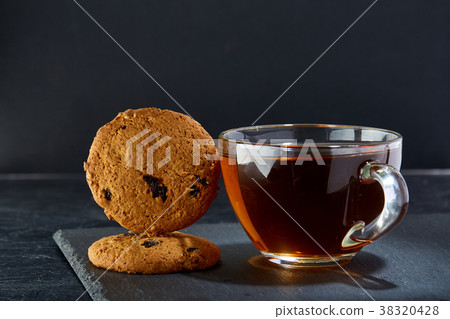 Shallow depth of field photo of a glass cup of Shallow depth of field photo of a glass cup of 38320428