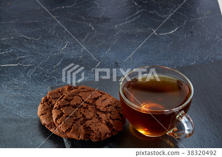 Shallow depth of field photo of a glass cup of 38320492