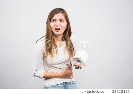 Woman with toilet paper and problems with her Woman with toilet paper and problems with her 38320555