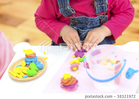 Kids playing with clay 38321972