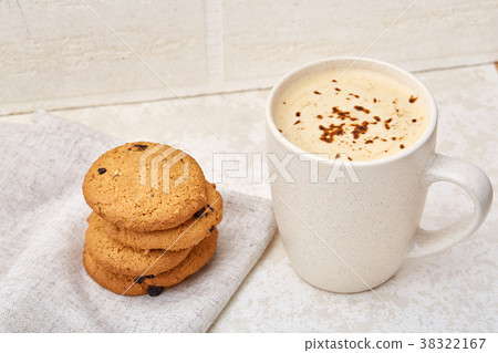 Cup of coffee and biscuit isolated on the white 38322167