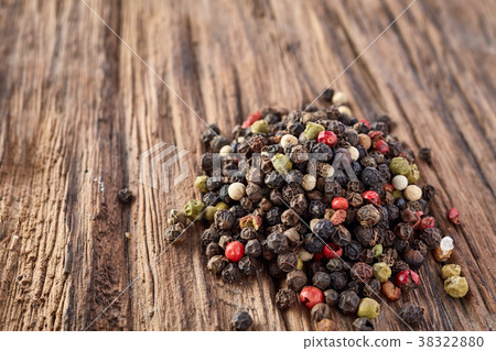 Top view on black, red and white peppercorns 38322880