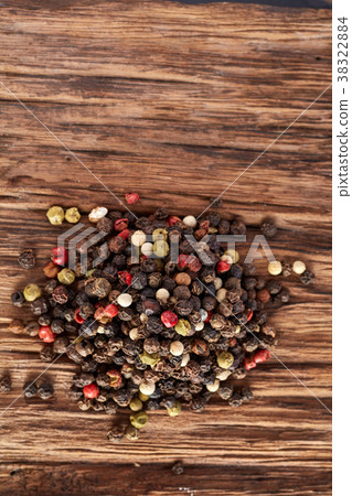 Top view on black, red and white peppercorns 38322884