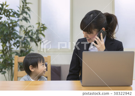Parenting mom doing home work 38322942