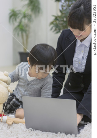 Parenting mom doing home work 38322953