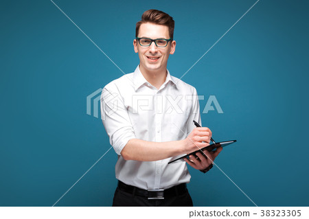 Attractive young businessman in costly watch Attractive young businessman in costly watch 38323305