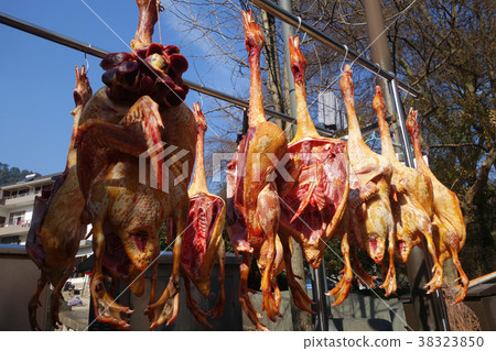 The meat drying outside on the sun The meat drying outside on the sun 38323850