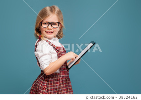 Cute little girl in red dress, white shirt and Cute little girl in red dress, white shirt and 38324162
